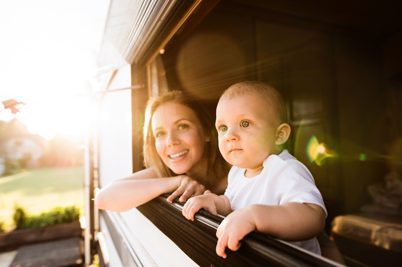 Mother and child in caravan